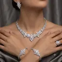 Luxury floral motif necklace, earring, ring and bracelet set - rose-shaped zircon stone, rhodium plated.