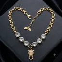 Luxurious gold-toned rhodium-plated tiger head five-stone chain necklace adorned with zircon stones.